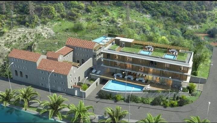 risan waterfront land for sale, boutique hotel project montenegro, stone palace restoration kotor bay, 2127m2 build area montenegro, unesco bay of kotor real estate, investment property risan,violet investment