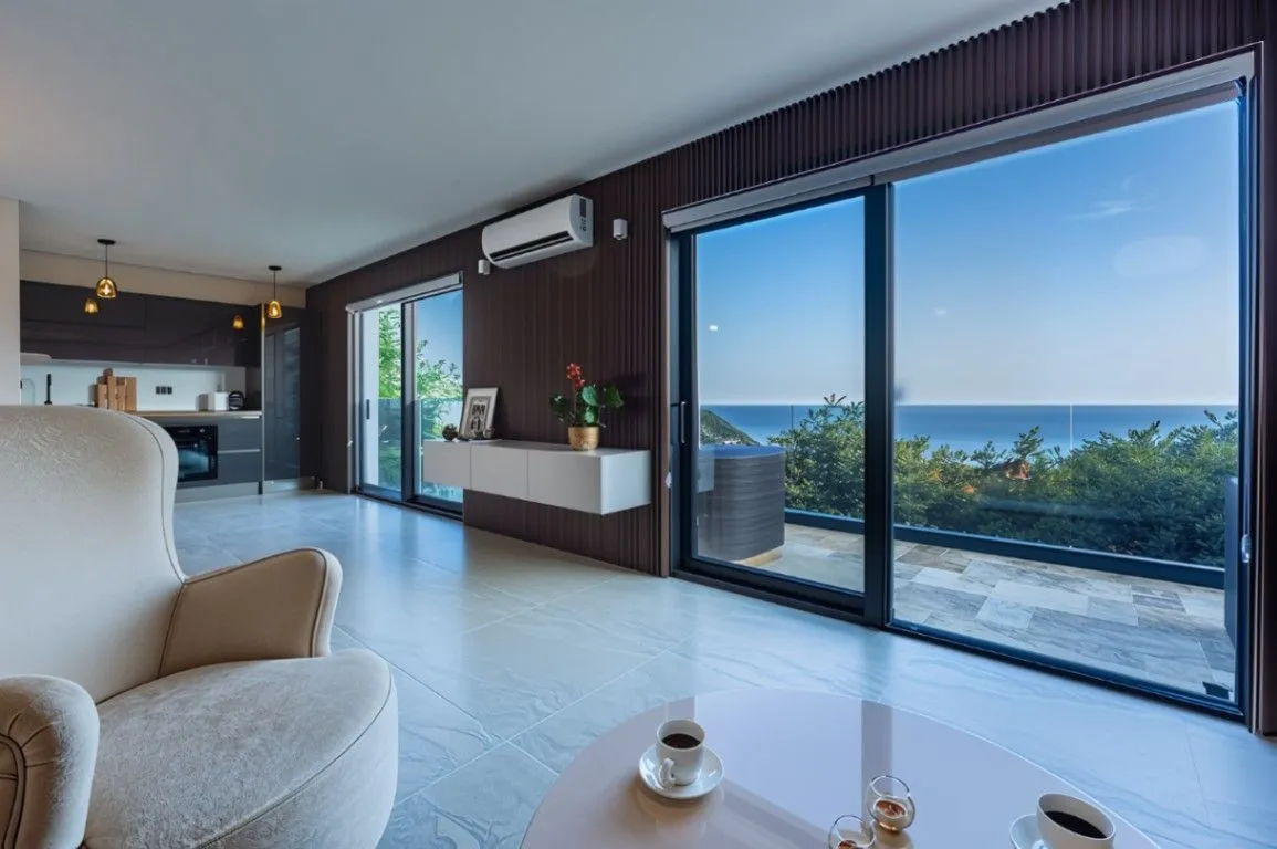 Contemporary villa in Markovići Budva with sea view Modern 8-bedroom villa in Budva Montenegro Luxury villa with swimming pool and panoramic sea view Villa with landscaped garden and outdoor kitchen Budva Travertine stone luxury home in Budva Sea view terrace villa in Montenegro Three-level villa with private parking Budva Mosaic pool luxury property in Markovići Modern Mediterranean villa in Budva Montenegro Coastal real estate for sale in Budva with pool,violet investment,budva,montenegro,investment
