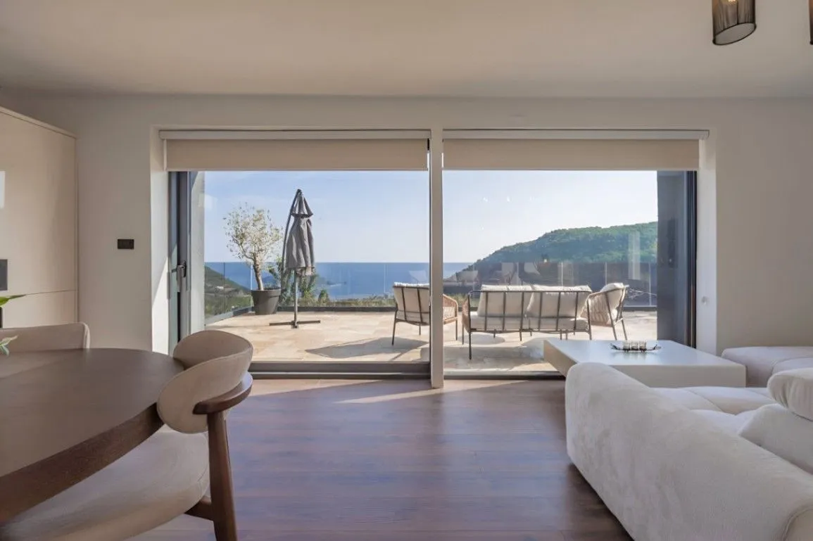 Contemporary villa in Markovići Budva with sea view Modern 8-bedroom villa in Budva Montenegro Luxury villa with swimming pool and panoramic sea view Villa with landscaped garden and outdoor kitchen Budva Travertine stone luxury home in Budva Sea view terrace villa in Montenegro Three-level villa with private parking Budva Mosaic pool luxury property in Markovići Modern Mediterranean villa in Budva Montenegro Coastal real estate for sale in Budva with pool,violet investment,budva,montenegro,investment