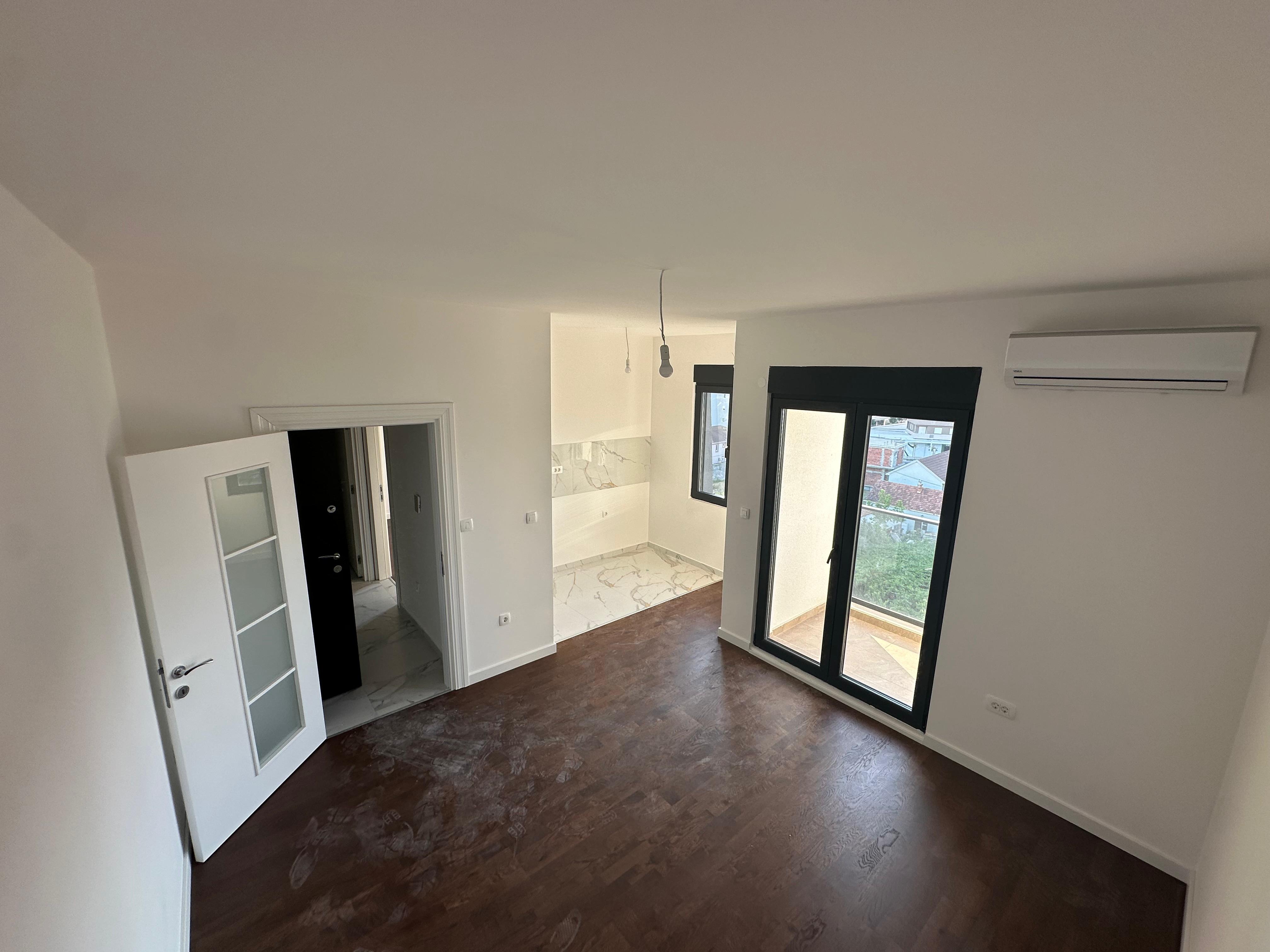 central point podgorica apartment with garage; apartment for sale central point; 1+1 podgorica private garage; delta city mall apartment; new build 2024 podgorica; balcony elevator security,violet investment,podgorica, apartment for sale, karadag yatirim, karadag da emlak yatirimi, real estate in montenegro, montenegro investment
