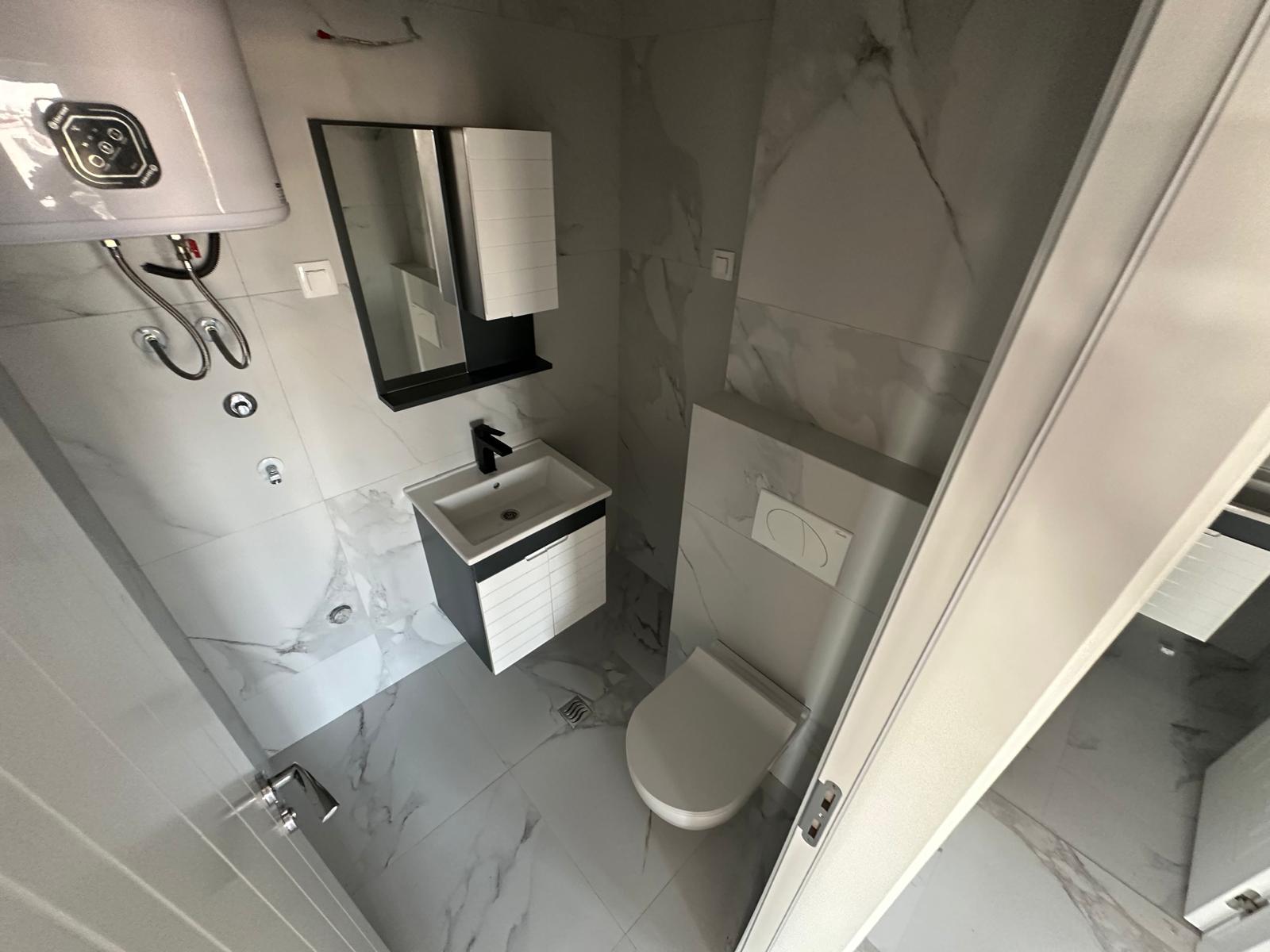 central point podgorica apartment with garage; apartment for sale central point; 1+1 podgorica private garage; delta city mall apartment; new build 2024 podgorica; balcony elevator security,violet investment,podgorica, apartment for sale, karadag yatirim, karadag da emlak yatirimi, real estate in montenegro, montenegro investment