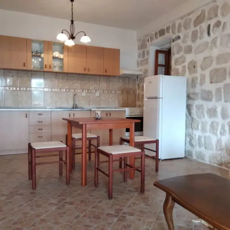 Perast 87 m2 apartment for sale, Bay of Kotor property, stone house apartment Montenegro, sea view terrace Perast, two bedroom Perast real estate, first-floor apartment Kotor Bay, historic stone home Montenegro, private property Perast, Section G clear title Montenegro