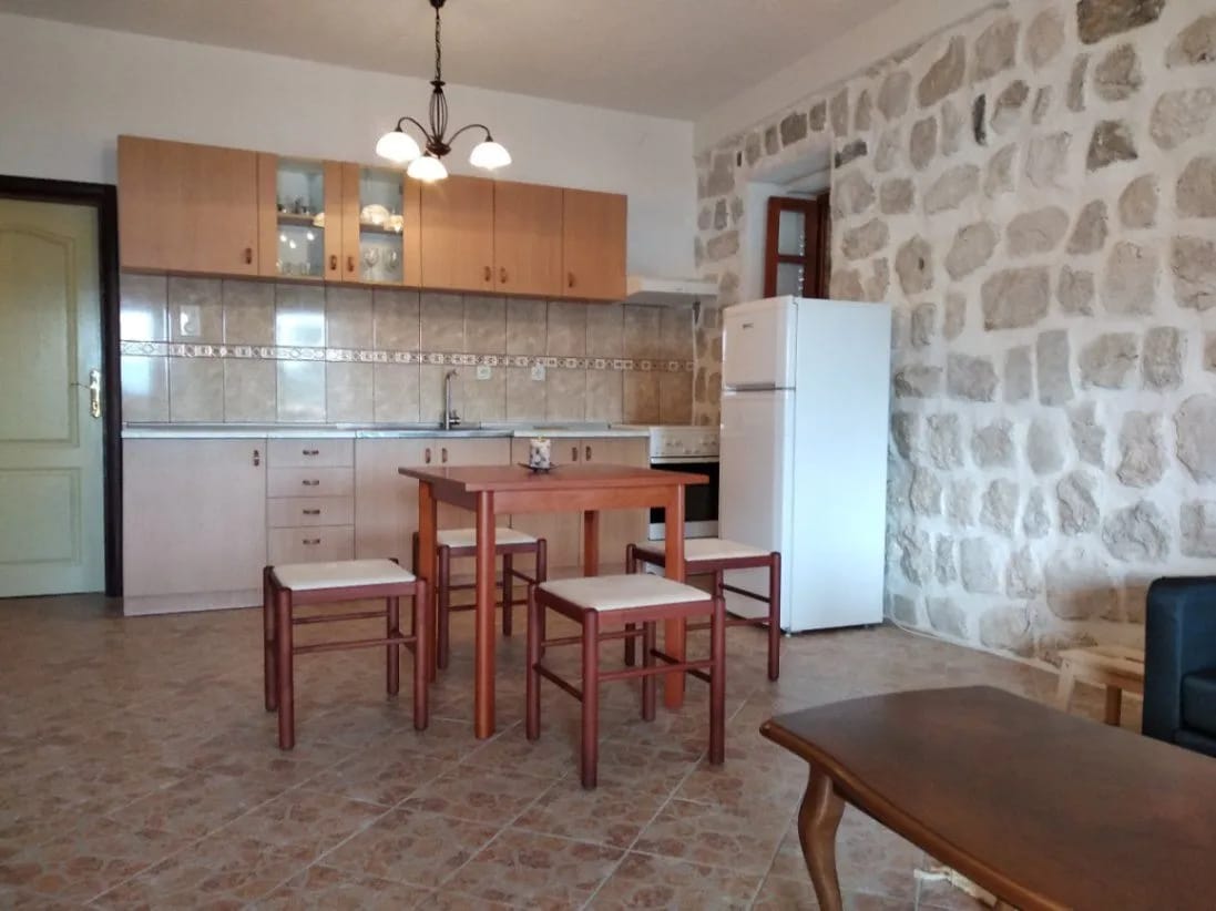 Perast 87 m2 apartment for sale, Bay of Kotor property, stone house apartment Montenegro, sea view terrace Perast, two bedroom Perast real estate, first-floor apartment Kotor Bay, historic stone home Montenegro, private property Perast, Section G clear title Montenegro