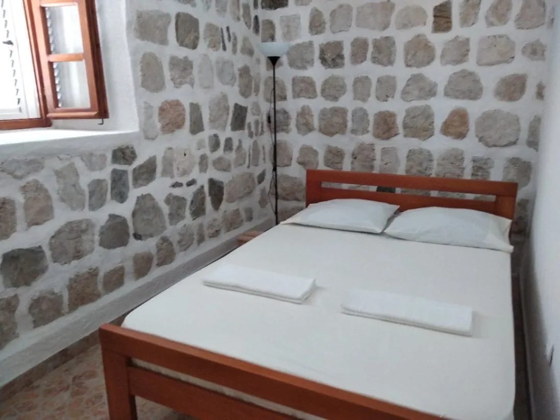 Perast 87 m2 apartment for sale, Bay of Kotor property, stone house apartment Montenegro, sea view terrace Perast, two bedroom Perast real estate, first-floor apartment Kotor Bay, historic stone home Montenegro, private property Perast, Section G clear title Montenegro