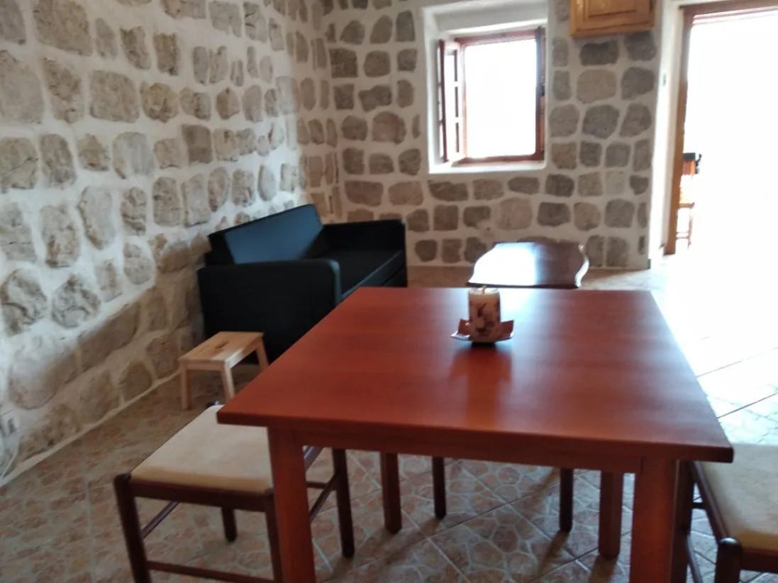 Perast 87 m2 apartment for sale, Bay of Kotor property, stone house apartment Montenegro, sea view terrace Perast, two bedroom Perast real estate, first-floor apartment Kotor Bay, historic stone home Montenegro, private property Perast, Section G clear title Montenegro