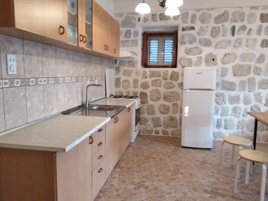 Perast 87 m2 apartment for sale, Bay of Kotor property, stone house apartment Montenegro, sea view terrace Perast, two bedroom Perast real estate, first-floor apartment Kotor Bay, historic stone home Montenegro, private property Perast, Section G clear title Montenegro
