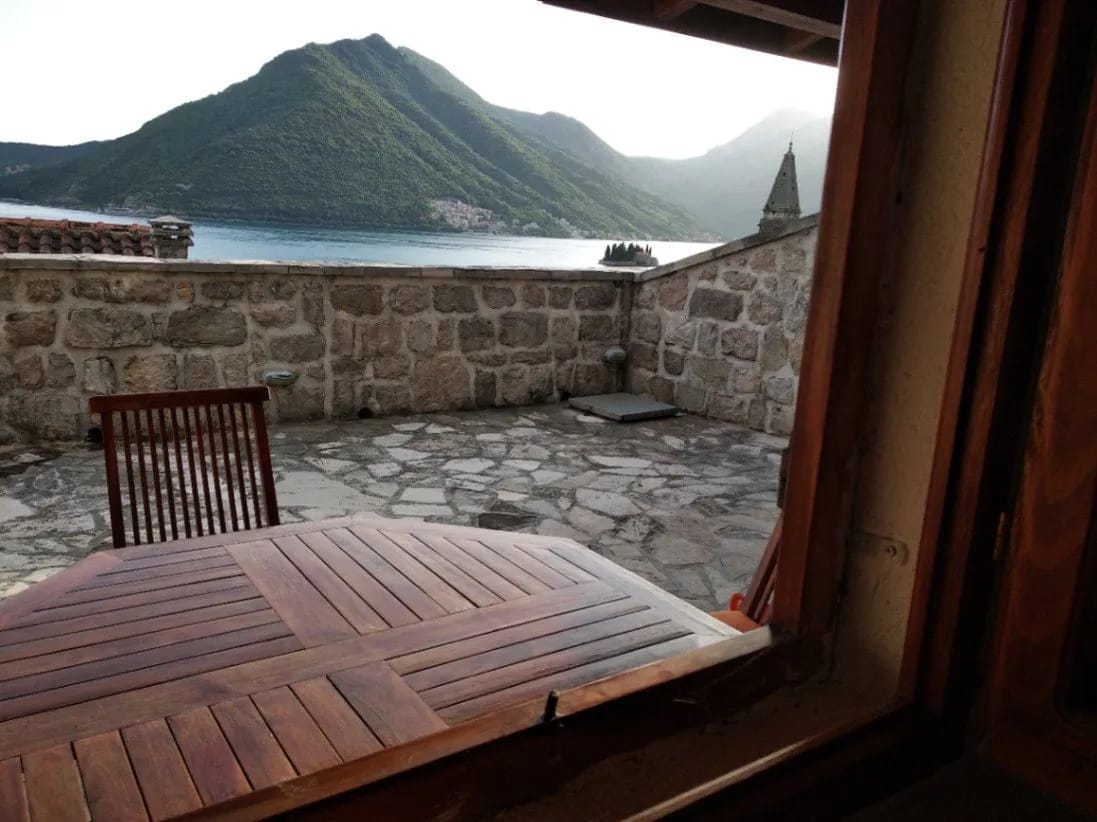 Perast 87 m2 apartment for sale, Bay of Kotor property, stone house apartment Montenegro, sea view terrace Perast, two bedroom Perast real estate, first-floor apartment Kotor Bay, historic stone home Montenegro, private property Perast, Section G clear title Montenegro