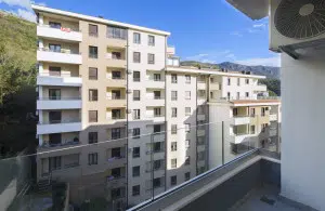 apartment for sale becici, wow building becici, 55 m2 apartment budva riviera, furnished apartment with lift montenegro, near beach apartment becici, rental investment becici, optional garage becici, idea market becici, budva real estate, violet investment, montenegro investment, karaday yatirim, budva becici