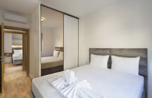 apartment for sale becici, wow building becici, 55 m2 apartment budva riviera, furnished apartment with lift montenegro, near beach apartment becici, rental investment becici, optional garage becici, idea market becici, budva real estate, violet investment, montenegro investment, karaday yatirim, budva becici