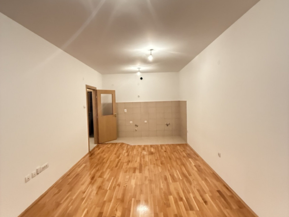 apartment for sale Podgorica, one bedroom apartment Podgorica, Ljubović apartment for sale, Aleksandra Divajna 1 Podgorica, Gradnja Promet building, 49 m2 apartment Podgorica, apartment with garage Podgorica, underground parking Podgorica, air conditioned apartment Podgorica, terrace apartment Podgorica, energy label B apartment, investment apartment Podgorica, rented apartment for sale Podgorica, quiet neighborhood Ljubović, near Capital Plaza Podgorica, near Delta City Podgorica, nekretnine Podgorica prodaja, jednosoban stan Ljubović, stan sa garažnim mjestom Podgorica, stan u novijoj zgradi Podgorica