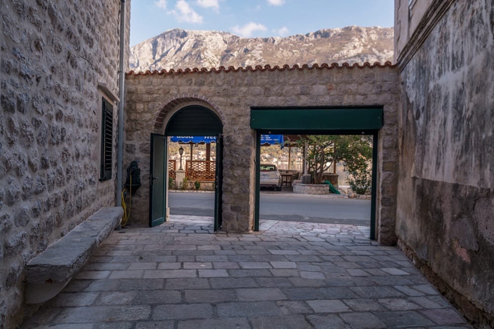 waterfront house for sale Prčanj, seafront estate Kotor Bay, boutique hotel for sale Montenegro, small resort with restaurant Montenegro, frontline property Bay of Kotor, UNESCO protected property Montenegro, stone house Prčanj, luxury guesthouse Kotor, house with pontoon Montenegro, property with private pier Montenegro, investment property Kotor Bay, restaurant with rooms Montenegro, Mediterranean stone villa for sale, seafront apartments Prčanj, hotel potential property Montenegro, 10 bedroom house Montenegro, renovated stone houses Bay of Kotor, coastal real estate Montenegro, waterfront restaurant Prčanj, nekretnine Prčanj prodaja, kuća na moru Boka Kotorska, kamenna kuća uz more Crna Gora, violet investment, violet investment montenegro