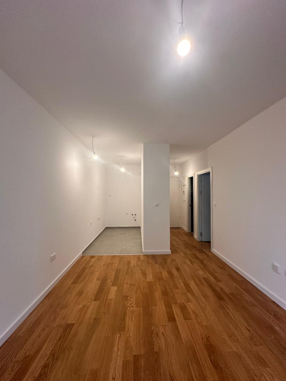 apartment for sale Bar, one bedroom apartment near beach, 45 m2 new apartment Montenegro, brand new flat October 2025, apartment near Anto Đedović school, apartment next to Aroma store Bar, first floor apartment Montenegro, underfloor heating apartment, wooden floors apartment Bar, 1 bedroom flat with balcony, partial sea view apartment, new building near beach Bar, for sale by owner Montenegro, holiday home Bar Montenegro, investment apartment near sea, apartment with underground parking option, quiet apartment not on main road, nekretnine Bar prodaja, jednosoban stan novogradnja Bar, stan blizu mora i škole Bar, violet investment, violet investment montenegro