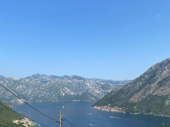 stone house for sale Gornji Stoliv, UNESCO protected area Kotor, traditional stone house Montenegro, 3-level stone house Boka Bay, house 600m from sea Kotor, village house Gornji Stoliv, renovation project Montenegro coast, property near St Ilija church Stoliv, house with village water and electricity, rural coastal property Montenegro, quiet location above sea Kotor Bay, nekretnine Kotor prodaja, kamena kuća Gornji Stoliv, kuća pod Unesco zaštitom Boka, trospratna kamena kuća Crna Gora, kuća 600m od mora Stoliv, seoska kuća sa strujom i vodom, autentična kamena kuća za renoviranje,violet investment, violet investment montenegro