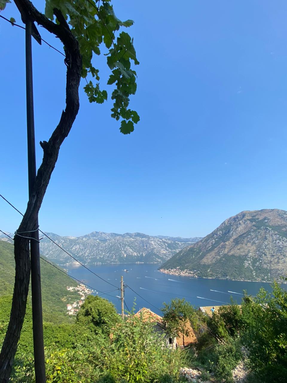 stone house for sale Gornji Stoliv, UNESCO protected area Kotor, traditional stone house Montenegro, 3-level stone house Boka Bay, house 600m from sea Kotor, village house Gornji Stoliv, renovation project Montenegro coast, property near St Ilija church Stoliv, house with village water and electricity, rural coastal property Montenegro, quiet location above sea Kotor Bay, nekretnine Kotor prodaja, kamena kuća Gornji Stoliv, kuća pod Unesco zaštitom Boka, trospratna kamena kuća Crna Gora, kuća 600m od mora Stoliv, seoska kuća sa strujom i vodom, autentična kamena kuća za renoviranje,violet investment, violet investment montenegro
