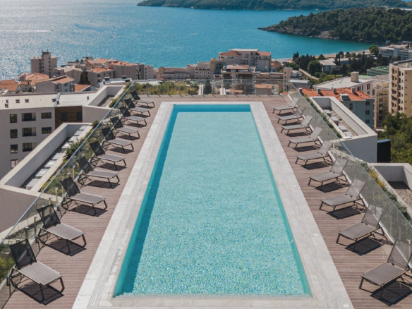 apartment for sale Bečići, Vuelo Sobre Bečići, one bedroom apartment 56 m2, new complex with rooftop pool Montenegro, apartment with gym Bečići, modern apartment near Bečići beach, investment apartment Budva Riviera, holiday home Bečići, 1 bedroom flat for sale Montenegro coast, new build apartment Bečići, nekretnine Bečići prodaja, jednosoban stan Vuelo Sobre Bečići, stan u novom kompleksu sa bazenom, investicioni stan Crna Gora, stan 195000e Bečići, violet investment,violet investment montenegro