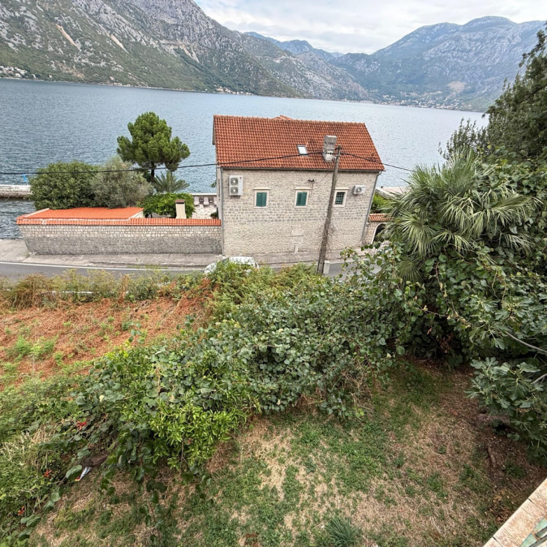 seafront house for sale Kotor, waterfront property Kostanjica, first line to the sea Montenegro, house with private ponta Montenegro, 200 m2 house 1700 m2 land, large seafront plot Kotor Bay, luxury villa potential Montenegro, investment property Bay of Kotor, seaside house Montenegro for sale, property with mooring Montenegro, urbanized land with house Kotor, house with terraces sea view Montenegro, exclusive coastal property Montenegro, nekretnine Kotor prodaja, kuća na moru Kostanjica, kuća prvi red do mora Boka, plac uz more Crna Gora, kuća sa pontom Crna Gora, investiciona nekretnina na obali Crne Gore