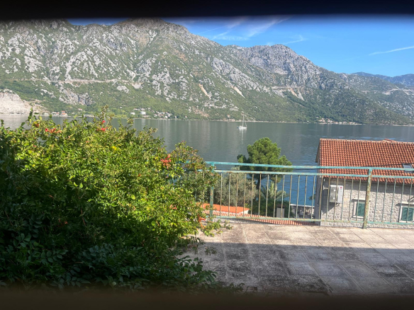 seafront house for sale Kotor, waterfront property Kostanjica, first line to the sea Montenegro, house with private ponta Montenegro, 200 m2 house 1700 m2 land, large seafront plot Kotor Bay, luxury villa potential Montenegro, investment property Bay of Kotor, seaside house Montenegro for sale, property with mooring Montenegro, urbanized land with house Kotor, house with terraces sea view Montenegro, exclusive coastal property Montenegro, nekretnine Kotor prodaja, kuća na moru Kostanjica, kuća prvi red do mora Boka, plac uz more Crna Gora, kuća sa pontom Crna Gora, investiciona nekretnina na obali Crne Gore, violet investment, violet investment montenegro