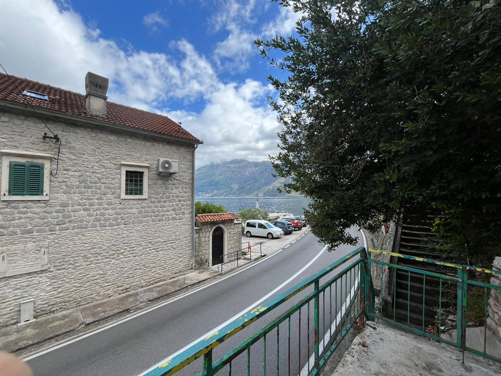 seafront house for sale Kotor, waterfront property Kostanjica, first line to the sea Montenegro, house with private ponta Montenegro, 200 m2 house 1700 m2 land, large seafront plot Kotor Bay, luxury villa potential Montenegro, investment property Bay of Kotor, seaside house Montenegro for sale, property with mooring Montenegro, urbanized land with house Kotor, house with terraces sea view Montenegro, exclusive coastal property Montenegro, nekretnine Kotor prodaja, kuća na moru Kostanjica, kuća prvi red do mora Boka, plac uz more Crna Gora, kuća sa pontom Crna Gora, investiciona nekretnina na obali Crne Gore, violet investment, violet investment montenegro