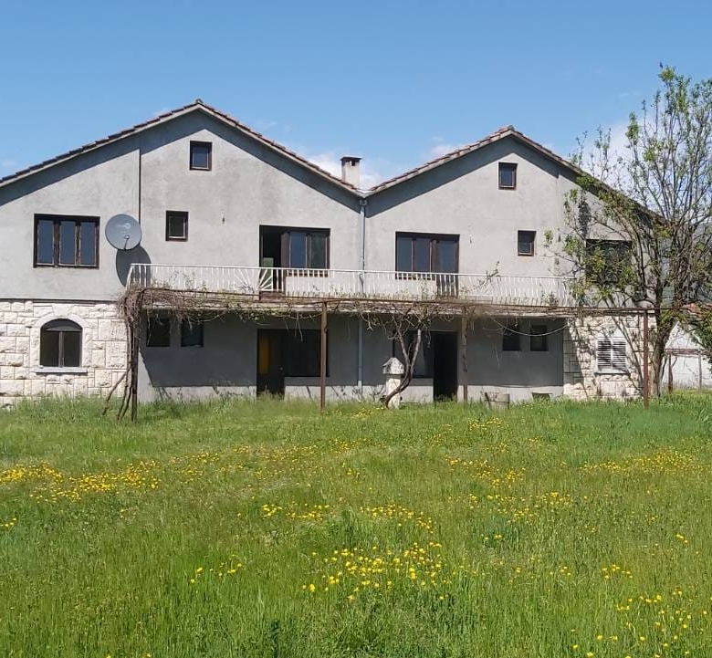 house for sale Danilovgrad, Pažići house with land, 360 m2 house with 2341 m2 plot, two-unit house Montenegro, semi-detached house Danilovgrad, house with garages for each unit, property near railway station Danilovgrad, large family house Montenegro, house with auxiliary building registered, multi-family home for sale Montenegro, investment property Danilovgrad, nekretnine Danilovgrad prodaja, kuća Pažići Danilovgrad, kuća sa velikom parcelom Crna Gora, dvoetažna kuća sa potkrovljem, kuća podijeljena na dva stana, kuća 1/1 bez tereta, porodična kuća sa garažama Danilovgrad, violet investment, violet investment montenegro