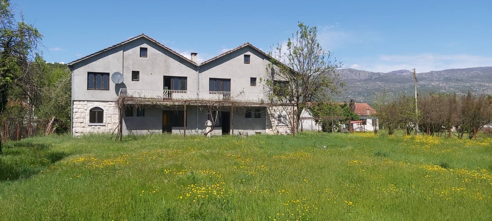 house for sale Danilovgrad, Pažići house with land, 360 m2 house with 2341 m2 plot, two-unit house Montenegro, semi-detached house Danilovgrad, house with garages for each unit, property near railway station Danilovgrad, large family house Montenegro, house with auxiliary building registered, multi-family home for sale Montenegro, investment property Danilovgrad, nekretnine Danilovgrad prodaja, kuća Pažići Danilovgrad, kuća sa velikom parcelom Crna Gora, dvoetažna kuća sa potkrovljem, kuća podijeljena na dva stana, kuća 1/1 bez tereta, porodična kuća sa garažama Danilovgrad, violet investment, violet investment montenegro