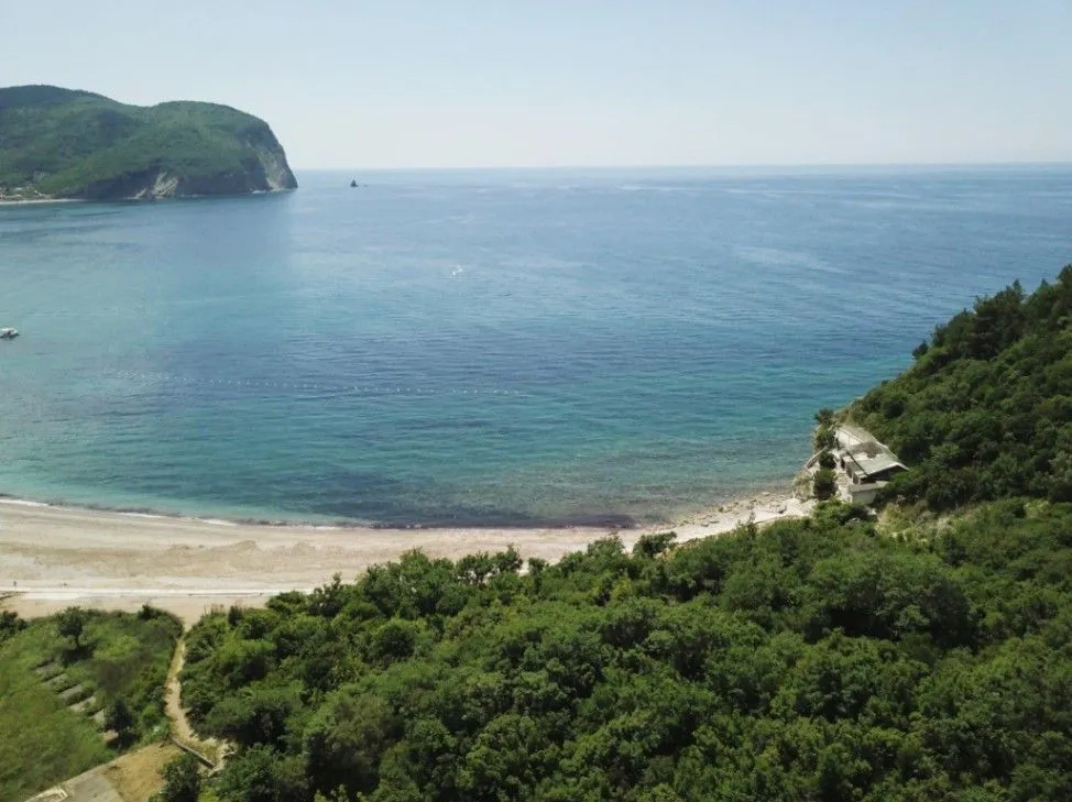 seafront land for sale Montenegro, Buljarica beachfront plot, 7642 m2 land with private beach, hotel development land Budva Riviera, aparthotel project Montenegro, urbanized seafront plot UTU, land with 150m private beach, investment land Adriatic coast, hotel resort land Buljarica, coastal development opportunity Montenegro, nekretnine Buljarica prodaja, građevinsko zemljište prvi red do mora, plac za hotel 148 soba, zemljište za aparthotel 50 apartmana, investiciono zemljište Crna Gora morе,violet investment, violet investment montenegro