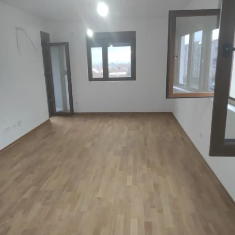 apartment for sale Stari Aerodrom, 2 bedroom apartment 56 m2 Podgorica, new building high quality Stari Aerodrom, never occupied flat Podgorica, functional layout 2BR apartment, open plan living dining kitchen, double oriented apartment east north, flat with balcony Podgorica, family apartment Stari Aerodrom, investment apartment Podgorica, nekretnine Podgorica prodaja, dvosoban stan Stari Aerodrom novogradnja, stan 56m2 sa dvije spavaće, stan sa kupatilom i toaletom, prostran javni parking ispred zgrade, violet investment, violet investment montenegro