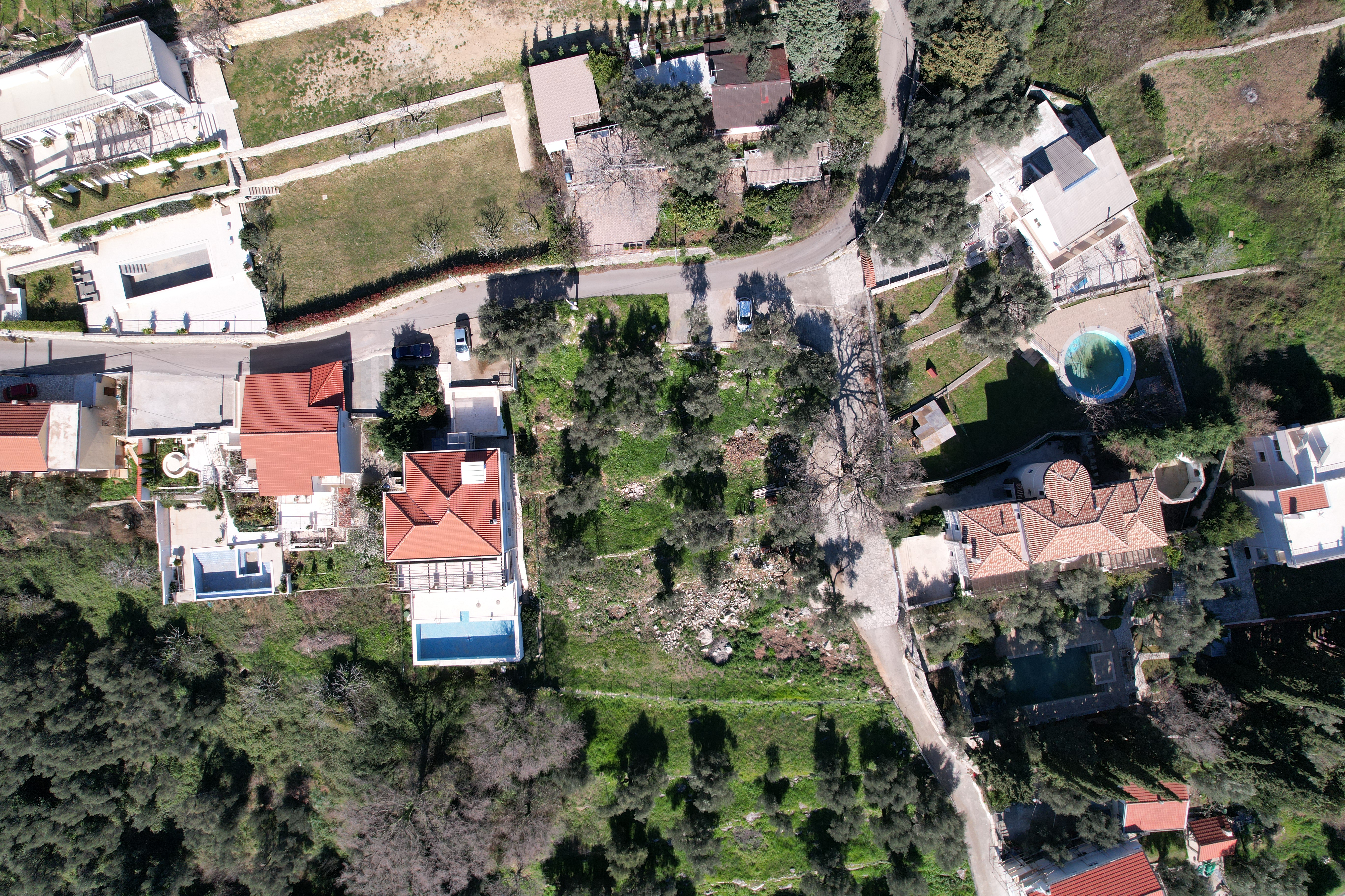 sea view land for sale Montenegro, 1740 m2 plot Adriatic, villa land near Budva, luxury residential land Montenegro, panoramic sea view plot, tiered terrain for villas, prestigious coastal area Montenegro, land for two villas for sale, investment land near Budva, private road access land, land surrounded by luxury villas, exclusive coastal plot Montenegro, nekretnine zemljište prodaja, plac sa pogledom na more Crna Gora, zemljište za luksuznu vilu, plac za dvije vile, investiciono zemljište primorje Crne Gore,violet investment, violet investment montenegro