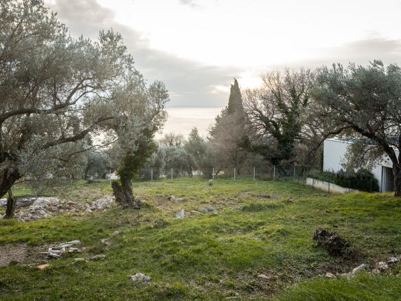 sea view land for sale Montenegro, 1740 m2 plot Adriatic, villa land near Budva, luxury residential land Montenegro, panoramic sea view plot, tiered terrain for villas, prestigious coastal area Montenegro, land for two villas for sale, investment land near Budva, private road access land, land surrounded by luxury villas, exclusive coastal plot Montenegro, nekretnine zemljište prodaja, plac sa pogledom na more Crna Gora, zemljište za luksuznu vilu, plac za dvije vile, investiciono zemljište primorje Crne Gore,violet investment, violet investment montenegro