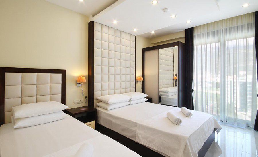 apartment for sale Bečići, luxury apartment Shine Bečići, 2 bedroom sea view apartment Montenegro, 80 m2 apartment Budva Riviera, aparthotel Shine property, beachfront apartment Bečići, 50m from beach Montenegro, A+ energy class apartment, apartment with rental management Montenegro, invest in Budva Riviera, holiday home Bečići, apartment near sea Montenegro, nekretnine Bečići prodaja, dvosoban lux stan Shine, stan prvi red do mora Bečići, apartman za izdavanje preko hotela, stan sa garažnim mjestom opcija, investiciona nekretnina Crna Gora, violet investment, violet investment montenegro