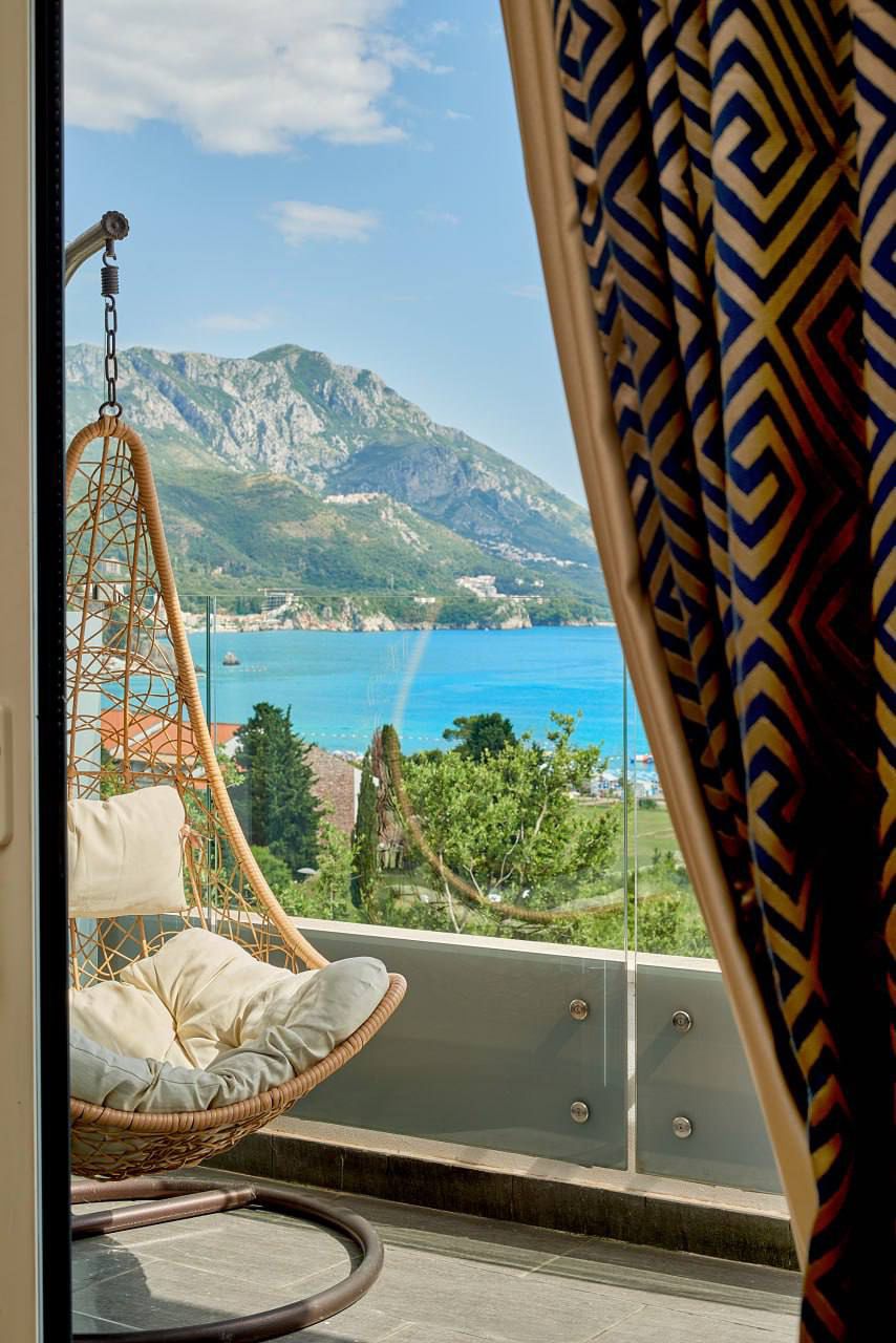 luxury apartment for sale Montenegro, Skyline complex first line to the sea, 1 bedroom sea view apartment 73 m2, panoramic sea view apartment, private lift to the beach, apartment with large terrace Adriatic coast, furnished designer apartment Montenegro, apartment with pools and concierge, rental management property Montenegro, holiday home sea view, investment apartment Montenegro coast, luxury resort-style living, nekretnine na moru prodaja, lux apartman Skyline, stan prvi red do mora, panorama stan sa terasom, apartman sa bazenima i restoranom, investiciona nekretnina Crna Gora,violet investment,violet investment montenegro