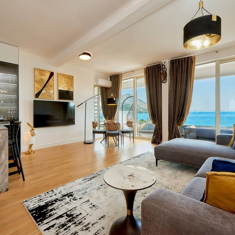 luxury apartment for sale Montenegro, Skyline complex first line to the sea, 1 bedroom sea view apartment 73 m2, panoramic sea view apartment, private lift to the beach, apartment with large terrace Adriatic coast, furnished designer apartment Montenegro, apartment with pools and concierge, rental management property Montenegro, holiday home sea view, investment apartment Montenegro coast, luxury resort-style living, nekretnine na moru prodaja, lux apartman Skyline, stan prvi red do mora, panorama stan sa terasom, apartman sa bazenima i restoranom, investiciona nekretnina Crna Gora,violet investment,violet investment montenegro