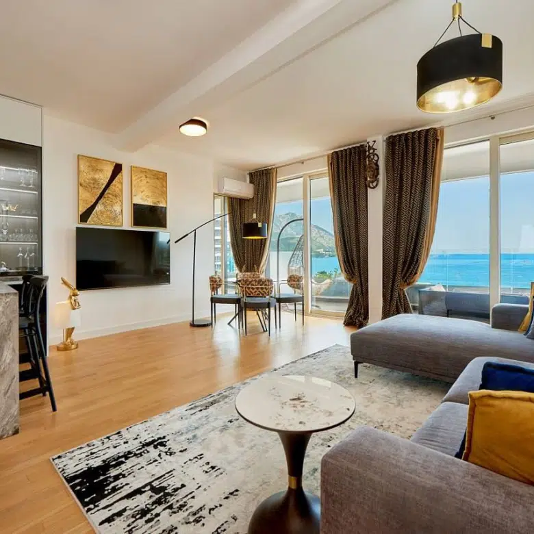 luxury apartment for sale Montenegro, Skyline complex first line to the sea, 1 bedroom sea view apartment 73 m2, panoramic sea view apartment, private lift to the beach, apartment with large terrace Adriatic coast, furnished designer apartment Montenegro, apartment with pools and concierge, rental management property Montenegro, holiday home sea view, investment apartment Montenegro coast, luxury resort-style living, nekretnine na moru prodaja, lux apartman Skyline, stan prvi red do mora, panorama stan sa terasom, apartman sa bazenima i restoranom, investiciona nekretnina Crna Gora,violet investment,violet investment montenegro