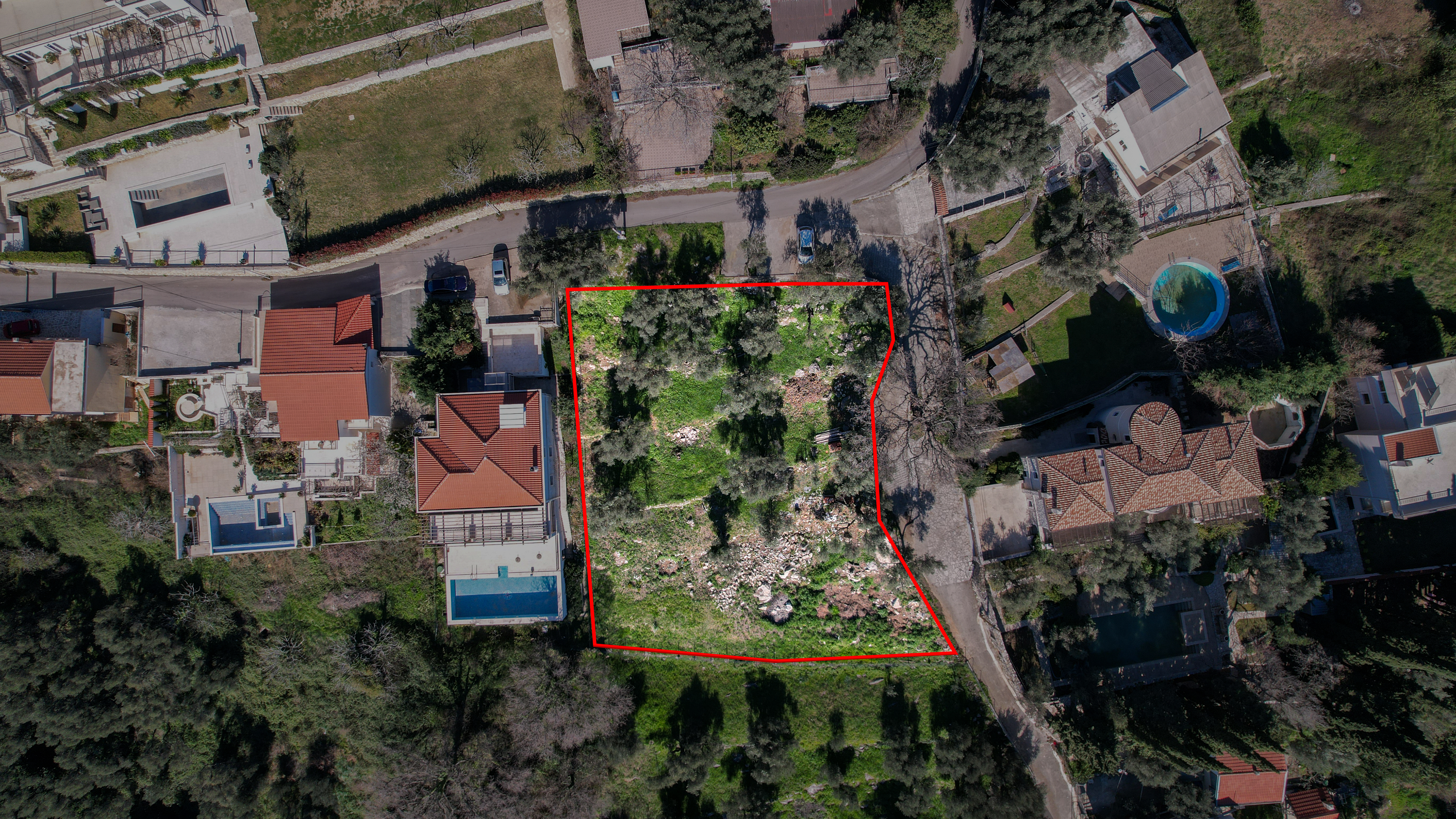 sea view land for sale Montenegro, 1740 m2 plot Adriatic, villa land near Budva, luxury residential land Montenegro, panoramic sea view plot, tiered terrain for villas, prestigious coastal area Montenegro, land for two villas for sale, investment land near Budva, private road access land, land surrounded by luxury villas, exclusive coastal plot Montenegro, nekretnine zemljište prodaja, plac sa pogledom na more Crna Gora, zemljište za luksuznu vilu, plac za dvije vile, investiciono zemljište primorje Crne Gore,violet investment, violet investment montenegro