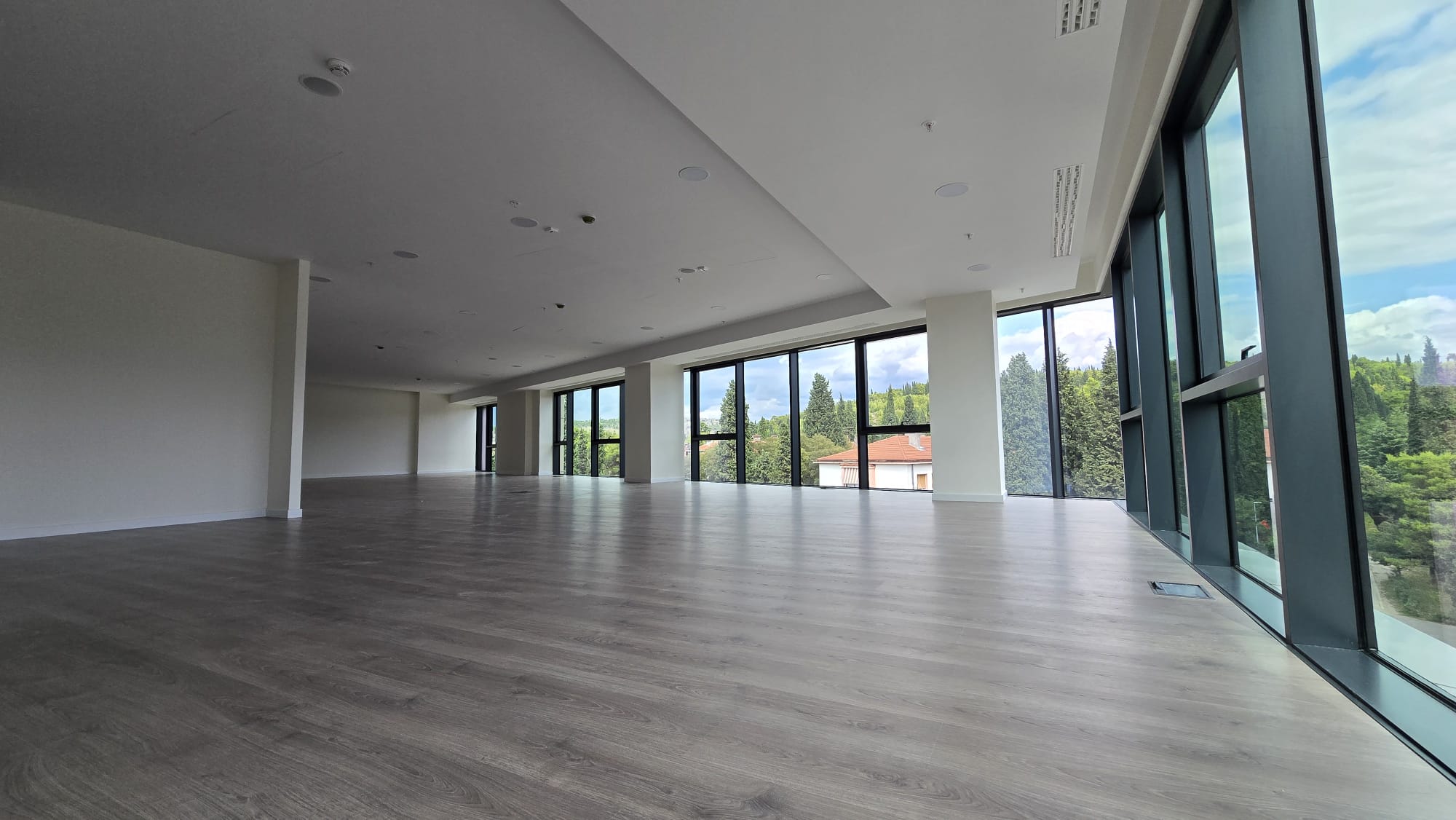 office building for sale, office building for rent, Grade A office building, prime commercial building, full building lease opportunity, corporate headquarters building, shell and core ground floor, Reynaers CS77 façade, HP Sunguard Neutral glass, office with backup generator, office building with CCTV, building with underground parking, KONE elevators office property, secure office with card access, commercial real estate investment, modern office space with high ceilings, mixed lease and sale options, office building with green areas, business property with storage and parking, violet investment,violet investment montenegro