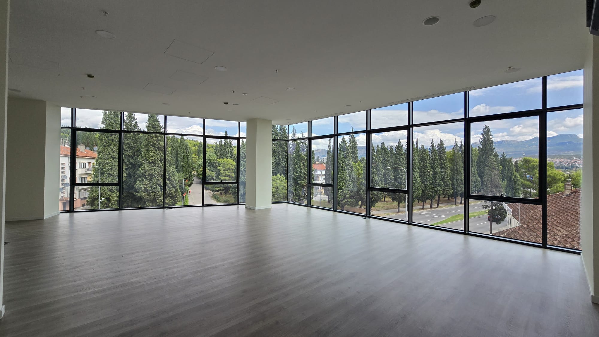 office building for sale, office building for rent, Grade A office building, prime commercial building, full building lease opportunity, corporate headquarters building, shell and core ground floor, Reynaers CS77 façade, HP Sunguard Neutral glass, office with backup generator, office building with CCTV, building with underground parking, KONE elevators office property, secure office with card access, commercial real estate investment, modern office space with high ceilings, mixed lease and sale options, office building with green areas, business property with storage and parking, violet investment,violet investment montenegro