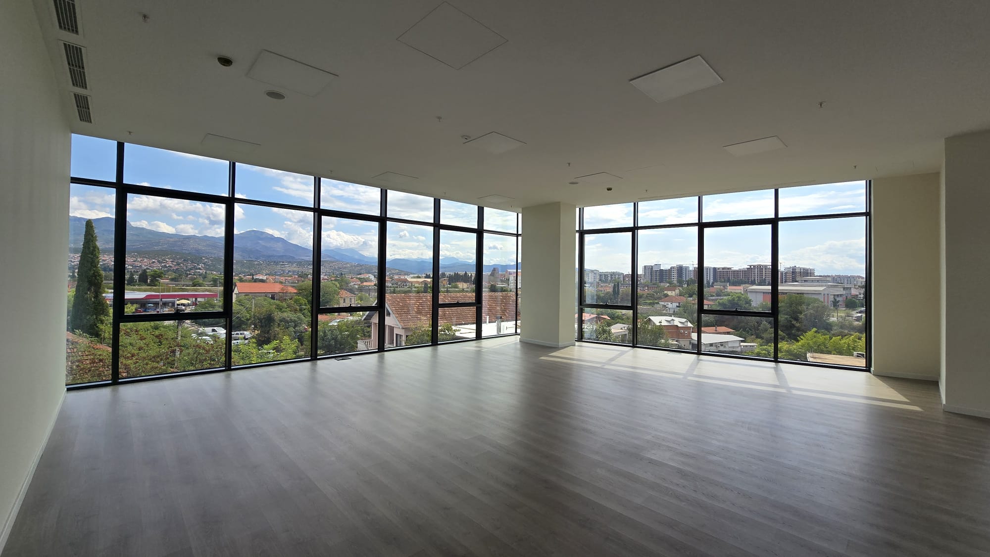 office building for sale, office building for rent, Grade A office building, prime commercial building, full building lease opportunity, corporate headquarters building, shell and core ground floor, Reynaers CS77 façade, HP Sunguard Neutral glass, office with backup generator, office building with CCTV, building with underground parking, KONE elevators office property, secure office with card access, commercial real estate investment, modern office space with high ceilings, mixed lease and sale options, office building with green areas, business property with storage and parking, violet investment,violet investment montenegro