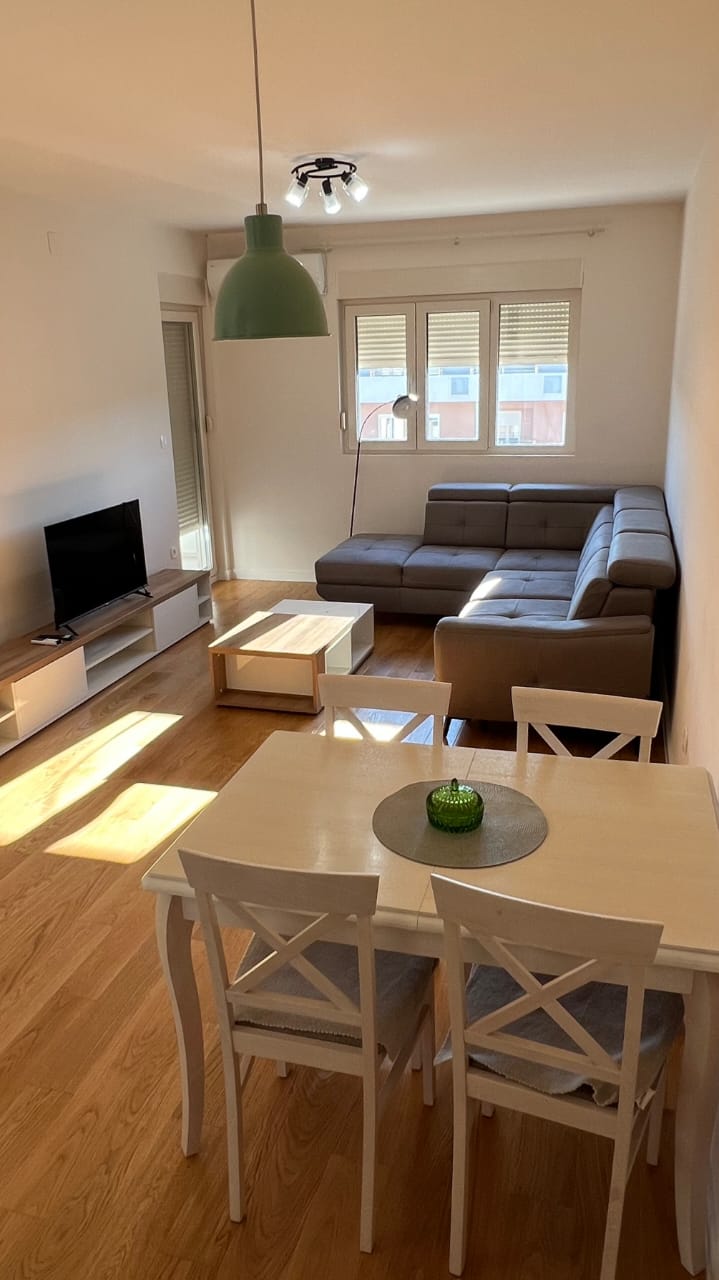 one-bedroom apartment for sale, apartment for sale 49m2, modern apartment for sale, fully furnished apartment, new build apartment 2021, top floor apartment, south facing apartment, apartment with two elevators, registered apartment uknjiženo, parquet flooring apartment, electric heating apartment, investment apartment for sale, move-in ready apartment, residential building apartment, public parking apartment, real estate sale listing, apartment for living or investment,violet investment,violet investment montenegro