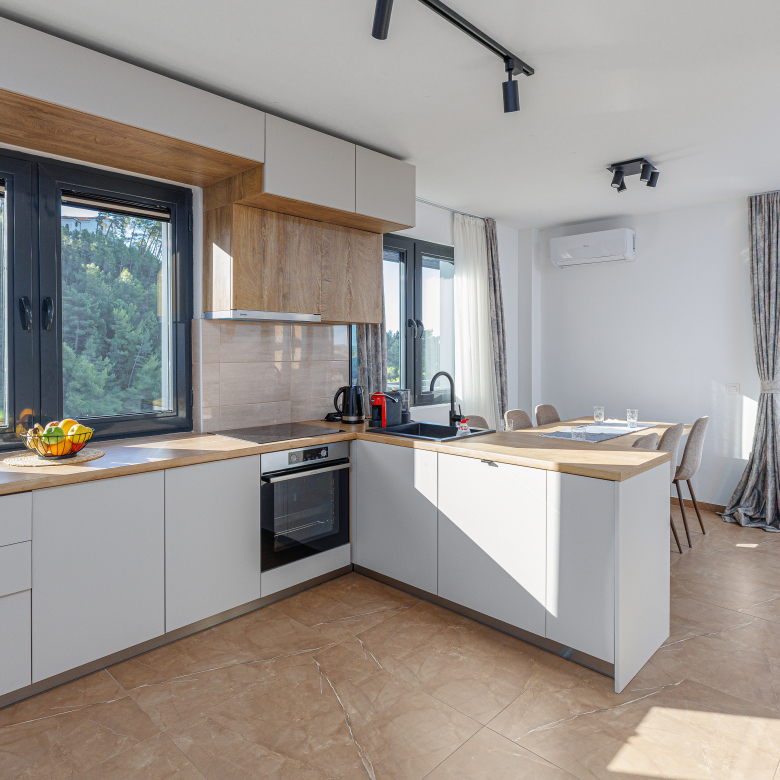 luxury apartment Sveti Stefan, sea view apartment Montenegro, apartment for sale Sveti Stefan resort, luxury real estate Montenegro, two-bedroom apartment sea view, presidential resort Sveti Stefan apartment, apartment with garage Montenegro, coastal luxury apartment Montenegro, investment property Sveti Stefan, premium apartment Montenegro, violet investment