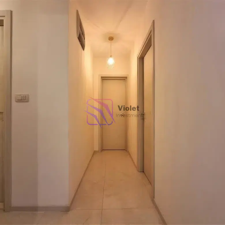 City Kej, Podgorica, two-bedroom apartment, 2 bedroom, 56 m2, 56 m², for sale, furnished, fully furnished, move-in ready, Zetagradnja, quality building, well maintained building, close to city center, near city centre, developing area, new MUP building, new residential complexes, new construction nearby, optional garage, garage space available, investment property, rental potential, central location, modern neighborhood, Podgorica real estate, apartment in Podgorica, violet investmentr