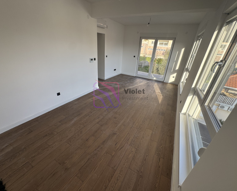 apartment for sale Donja Lastva Tivat, waterfront apartment Tivat Montenegro, apartment near sea Tivat 44 m2, luxury property Donja Lastva Montenegro, new construction apartment Tivat, investment apartment Tivat Montenegro, buy apartment near Porto Montenegro, real estate Tivat Montenegro, violet investment