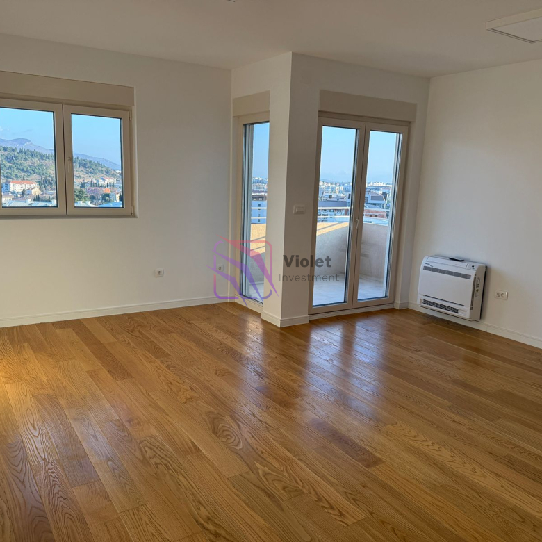 Two-Bedroom Apartment with Garage Space – Central Point, Podgorica