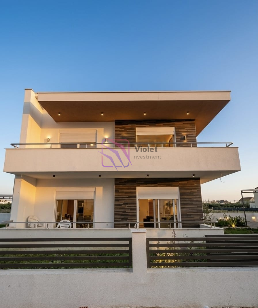 A modern family house for sale in Štoj, Ulcinj, offering the perfect balance of comfort, functionality, and privacy. With a total living area of 168 m² and a 250 m² landscaped yard, this property is ideal for family living, holiday use, or investment near the Adriatic coast. Located in a quiet residential area, the house is only a few minutes’ drive from the beach, providing a relaxed Mediterranean lifestyle. Property Overview Living area: 168 m² Land area: 250 m² Bedrooms: 4 Bathrooms: 2 Floors: 2 levels connected by internal staircase Parking: Covered parking for 2 vehicles Condition: Modern, fully equipped Location: Quiet neighborhood near the beach Interior Layout The house is carefully designed for comfortable family living, including: Spacious living room with kitchen and dining area Four bedrooms Two bathrooms Laundry room with new washing machine Functional layout with good separation of living and sleeping areas Features & Equipment Fully equipped modern kitchen with appliances Complete air conditioning system Travertine wall finishes Lowered ceilings with LED lighting High-quality materials and contemporary design Bright and comfortable interior spaces Outdoor Area 250 m² landscaped yard Outdoor and indoor lighting system Covered parking for 2 vehicles Possibility to build a swimming pool without reducing parking or green areas Location Štoj is a peaceful residential area near Ulcinj, known for: Long sandy beaches Natural surroundings and privacy Relaxed coastal atmosphere Increasing demand for residential properties The property is only a few minutes’ drive from the sea and local amenities. Investment Potential This property offers strong potential for: Permanent family residence Holiday home near the coast Rental investment during tourist season Future value increase due to location development FAQ — House in Štoj (168 m²) 1) What is for sale? A modern two-level family house of 168 m² in Štoj, Ulcinj. 2) How many bedrooms and bathrooms does the house have? The house includes 4 bedrooms and 2 bathrooms. 3) Does the property have parking? Yes, it includes covered parking for 2 vehicles. 4) Is the house furnished? The house is equipped with modern kitchen and appliances. 5) Is air conditioning installed? Yes, the property has complete air conditioning. 6) Can a swimming pool be built? Yes, the plot layout allows construction of a pool without affecting parking or yard space. 7) Is the location quiet? Yes, the property is located in a peaceful residential area. 8) How far is the beach? The beach is only a few minutes’ drive away. 9) Is the property suitable for investment? Yes, it is ideal for holiday rental or long-term value. 10) Who is this property ideal for? Ideal for families, investors, or buyers seeking a modern home near the sea, violet investment A modern family house for sale in Štoj, Ulcinj, offering the perfect balance of comfort, functionality, and privacy. With a total living area of 168 m² and a 250 m² landscaped yard, this property is ideal for family living, holiday use, or investment near the Adriatic coast. Located in a quiet residential area, the house is only a few minutes’ drive from the beach, providing a relaxed Mediterranean lifestyle. Property Overview Living area: 168 m² Land area: 250 m² Bedrooms: 4 Bathrooms: 2 Floors: 2 levels connected by internal staircase Parking: Covered parking for 2 vehicles Condition: Modern, fully equipped Location: Quiet neighborhood near the beach Interior Layout The house is carefully designed for comfortable family living, including: Spacious living room with kitchen and dining area Four bedrooms Two bathrooms Laundry room with new washing machine Functional layout with good separation of living and sleeping areas Features & Equipment Fully equipped modern kitchen with appliances Complete air conditioning system Travertine wall finishes Lowered ceilings with LED lighting High-quality materials and contemporary design Bright and comfortable interior spaces Outdoor Area 250 m² landscaped yard Outdoor and indoor lighting system Covered parking for 2 vehicles Possibility to build a swimming pool without reducing parking or green areas Location Štoj is a peaceful residential area near Ulcinj, known for: Long sandy beaches Natural surroundings and privacy Relaxed coastal atmosphere Increasing demand for residential properties The property is only a few minutes’ drive from the sea and local amenities. Investment Potential This property offers strong potential for: Permanent family residence Holiday home near the coast Rental investment during tourist season Future value increase due to location development FAQ — House in Štoj (168 m²) 1) What is for sale? A modern two-level family house of 168 m² in Štoj, Ulcinj. 2) How many bedrooms and bathrooms does the house have? The house includes 4 bedrooms and 2 bathrooms. 3) Does the property have parking? Yes, it includes covered parking for 2 vehicles. 4) Is the house furnished? The house is equipped with modern kitchen and appliances. 5) Is air conditioning installed? Yes, the property has complete air conditioning. 6) Can a swimming pool be built? Yes, the plot layout allows construction of a pool without affecting parking or yard space. 7) Is the location quiet? Yes, the property is located in a peaceful residential area. 8) How far is the beach? The beach is only a few minutes’ drive away. 9) Is the property suitable for investment? Yes, it is ideal for holiday rental or long-term value. 10) Who is this property ideal for? Ideal for families, investors, or buyers seeking a modern home near the sea, violet investment