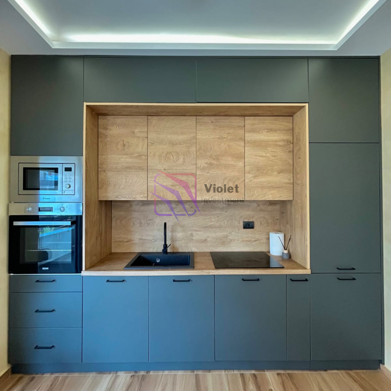 A modern family house for sale in Štoj, Ulcinj, offering the perfect balance of comfort, functionality, and privacy. With a total living area of 168 m² and a 250 m² landscaped yard, this property is ideal for family living, holiday use, or investment near the Adriatic coast. Located in a quiet residential area, the house is only a few minutes’ drive from the beach, providing a relaxed Mediterranean lifestyle. Property Overview Living area: 168 m² Land area: 250 m² Bedrooms: 4 Bathrooms: 2 Floors: 2 levels connected by internal staircase Parking: Covered parking for 2 vehicles Condition: Modern, fully equipped Location: Quiet neighborhood near the beach Interior Layout The house is carefully designed for comfortable family living, including: Spacious living room with kitchen and dining area Four bedrooms Two bathrooms Laundry room with new washing machine Functional layout with good separation of living and sleeping areas Features & Equipment Fully equipped modern kitchen with appliances Complete air conditioning system Travertine wall finishes Lowered ceilings with LED lighting High-quality materials and contemporary design Bright and comfortable interior spaces Outdoor Area 250 m² landscaped yard Outdoor and indoor lighting system Covered parking for 2 vehicles Possibility to build a swimming pool without reducing parking or green areas Location Štoj is a peaceful residential area near Ulcinj, known for: Long sandy beaches Natural surroundings and privacy Relaxed coastal atmosphere Increasing demand for residential properties The property is only a few minutes’ drive from the sea and local amenities. Investment Potential This property offers strong potential for: Permanent family residence Holiday home near the coast Rental investment during tourist season Future value increase due to location development FAQ — House in Štoj (168 m²) 1) What is for sale? A modern two-level family house of 168 m² in Štoj, Ulcinj. 2) How many bedrooms and bathrooms does the house have? The house includes 4 bedrooms and 2 bathrooms. 3) Does the property have parking? Yes, it includes covered parking for 2 vehicles. 4) Is the house furnished? The house is equipped with modern kitchen and appliances. 5) Is air conditioning installed? Yes, the property has complete air conditioning. 6) Can a swimming pool be built? Yes, the plot layout allows construction of a pool without affecting parking or yard space. 7) Is the location quiet? Yes, the property is located in a peaceful residential area. 8) How far is the beach? The beach is only a few minutes’ drive away. 9) Is the property suitable for investment? Yes, it is ideal for holiday rental or long-term value. 10) Who is this property ideal for? Ideal for families, investors, or buyers seeking a modern home near the sea, violet investment