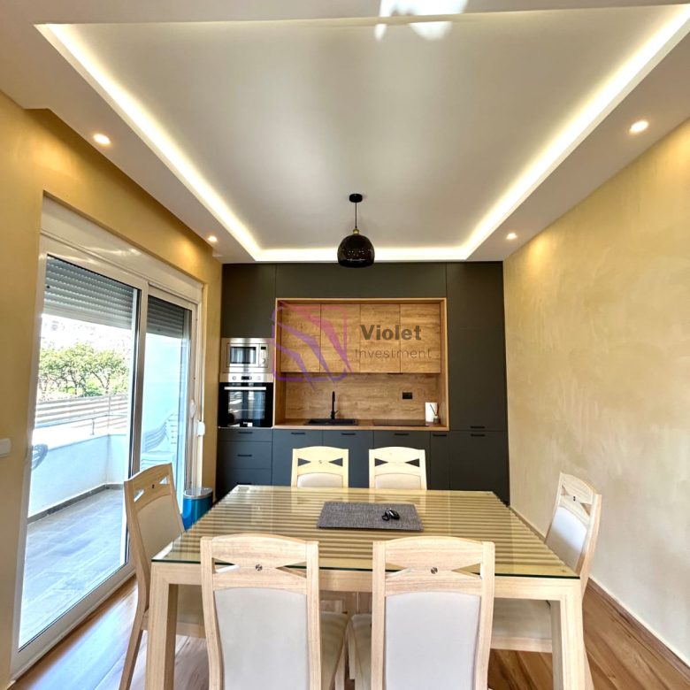 A modern family house for sale in Štoj, Ulcinj, offering the perfect balance of comfort, functionality, and privacy. With a total living area of 168 m² and a 250 m² landscaped yard, this property is ideal for family living, holiday use, or investment near the Adriatic coast. Located in a quiet residential area, the house is only a few minutes’ drive from the beach, providing a relaxed Mediterranean lifestyle. Property Overview Living area: 168 m² Land area: 250 m² Bedrooms: 4 Bathrooms: 2 Floors: 2 levels connected by internal staircase Parking: Covered parking for 2 vehicles Condition: Modern, fully equipped Location: Quiet neighborhood near the beach Interior Layout The house is carefully designed for comfortable family living, including: Spacious living room with kitchen and dining area Four bedrooms Two bathrooms Laundry room with new washing machine Functional layout with good separation of living and sleeping areas Features & Equipment Fully equipped modern kitchen with appliances Complete air conditioning system Travertine wall finishes Lowered ceilings with LED lighting High-quality materials and contemporary design Bright and comfortable interior spaces Outdoor Area 250 m² landscaped yard Outdoor and indoor lighting system Covered parking for 2 vehicles Possibility to build a swimming pool without reducing parking or green areas Location Štoj is a peaceful residential area near Ulcinj, known for: Long sandy beaches Natural surroundings and privacy Relaxed coastal atmosphere Increasing demand for residential properties The property is only a few minutes’ drive from the sea and local amenities. Investment Potential This property offers strong potential for: Permanent family residence Holiday home near the coast Rental investment during tourist season Future value increase due to location development FAQ — House in Štoj (168 m²) 1) What is for sale? A modern two-level family house of 168 m² in Štoj, Ulcinj. 2) How many bedrooms and bathrooms does the house have? The house includes 4 bedrooms and 2 bathrooms. 3) Does the property have parking? Yes, it includes covered parking for 2 vehicles. 4) Is the house furnished? The house is equipped with modern kitchen and appliances. 5) Is air conditioning installed? Yes, the property has complete air conditioning. 6) Can a swimming pool be built? Yes, the plot layout allows construction of a pool without affecting parking or yard space. 7) Is the location quiet? Yes, the property is located in a peaceful residential area. 8) How far is the beach? The beach is only a few minutes’ drive away. 9) Is the property suitable for investment? Yes, it is ideal for holiday rental or long-term value. 10) Who is this property ideal for? Ideal for families, investors, or buyers seeking a modern home near the sea, violet investment