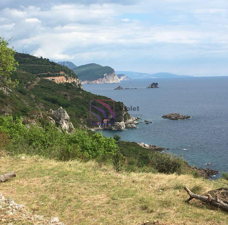 seafront land Rezevici Montenegro for sale, first line sea view land Budva Riviera, luxury villa plot Montenegro cliff property, development land Rezevici 2500m2, investment land Montenegro Adriatic coast, real estate Montenegro seafront plot,violet investment