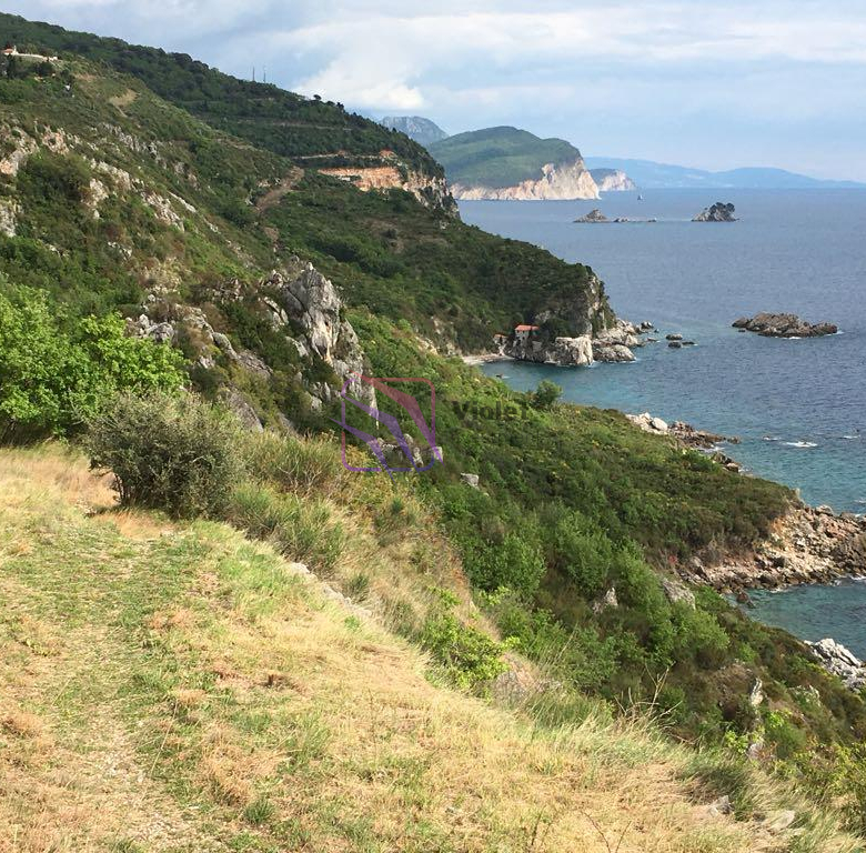 seafront land Rezevici Montenegro for sale, first line sea view land Budva Riviera, luxury villa plot Montenegro cliff property, development land Rezevici 2500m2, investment land Montenegro Adriatic coast, real estate Montenegro seafront plot,violet investment