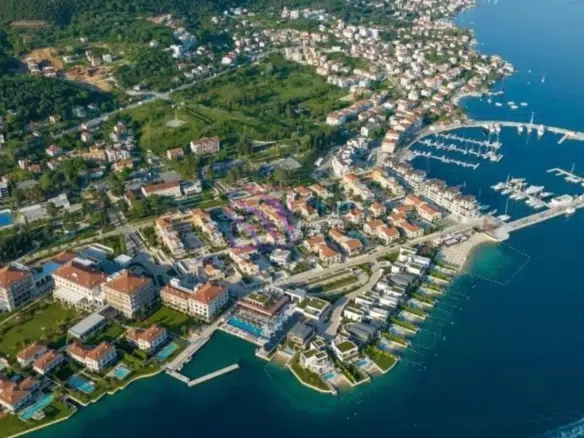 development land near Portonovi for sale, investment plot Herceg Novi Montenegro, building permit included land Montenegro, sea view development site Portonovi, luxury real estate project Montenegro, land with approved project Herceg Novi, Portonovi investment opportunity, development land Bay of Kotor Montenegro, violet investment