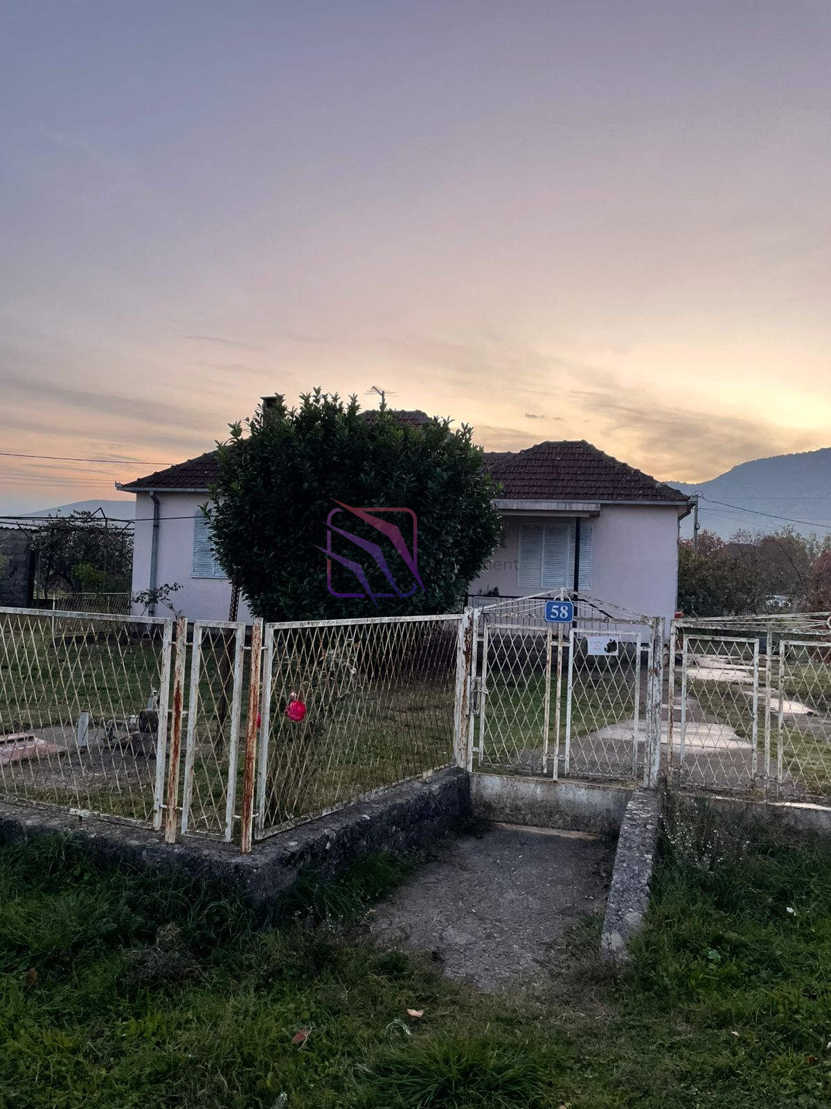 house for sale Botun, house for sale Podgorica, family house Montenegro, property with large yard Podgorica, house with land Montenegro, two bedroom house Podgorica, real estate Botun, investment property Podgorica, fenced yard house Montenegro, affordable house Podgorica,violet investment