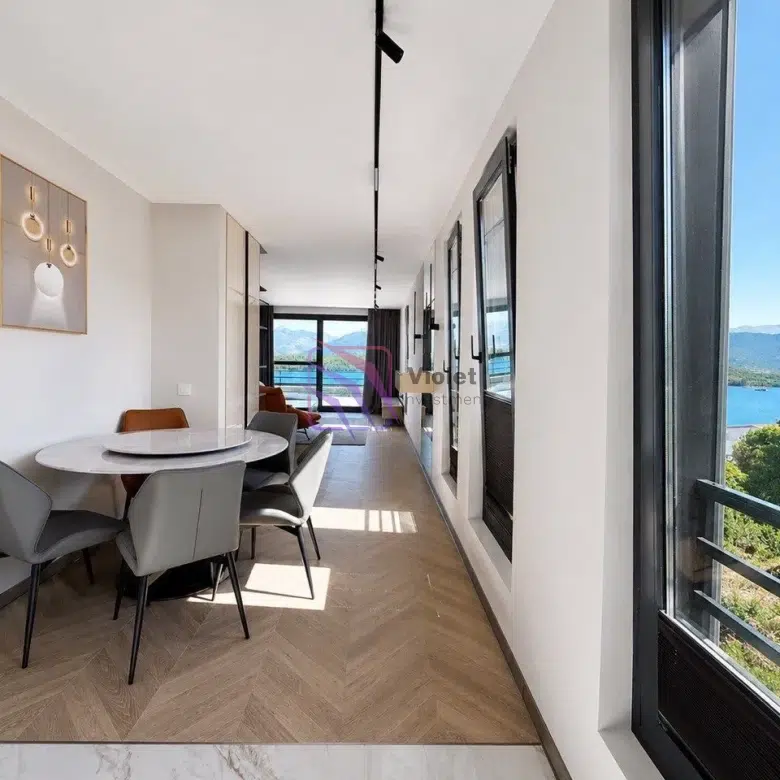 one bedroom apartment for sale Đuraševići, apartment for sale Tivat, sea view apartment Luštica, 110m2 apartment Montenegro, apartment with large terrace Tivat, furnished apartment for sale Montenegro, panoramic sea view apartment, property near Tivat Airport, investment apartment Luštica, real estate Tivat Montenegro,violet investment
